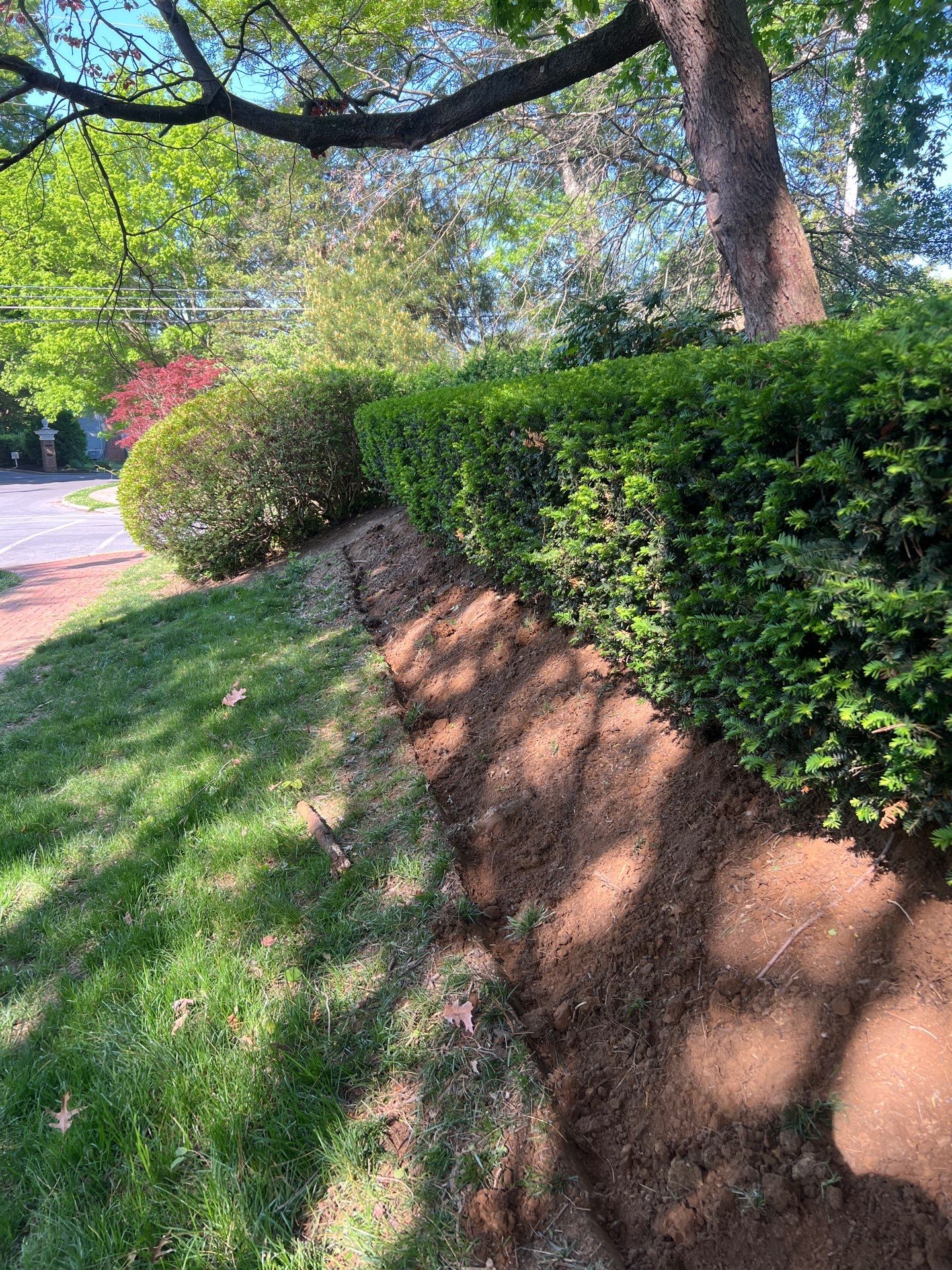 French Drain Installation — drainage trench along foundation